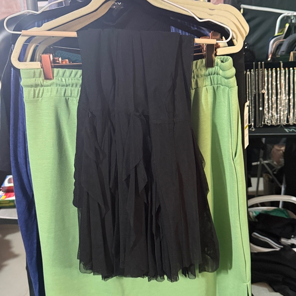 Beautiful unique flowy black skirt. European sizing measures like 14-16 XL- XXL